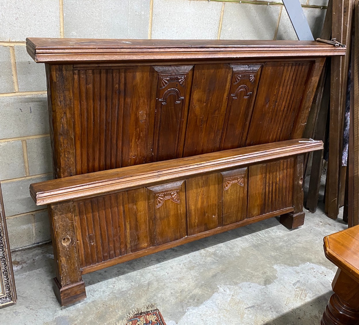 An Indonesian hardwood bedstead, width 182cm